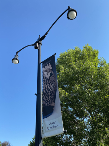 Amy Brenner Banner with pottery vase incised rooster design