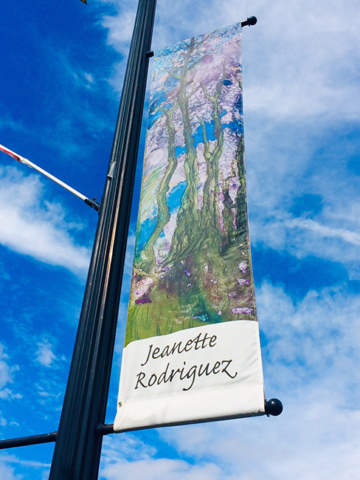 Jeanette Rodrigues alcohol ink painting banner against blue skies white clouds