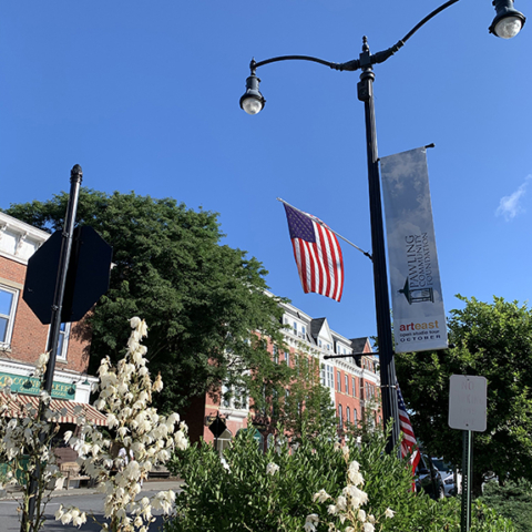 Pawling Community Foundation sponsor banner with village background