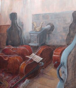 Cellos placed on floor ready for students to play