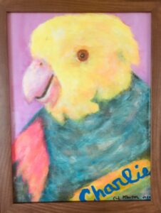 painting of parrot with yellow head and colorful body