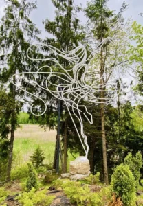 "Dancer II," captures the airy lightness of a dancer mid-leap while standing on a hill to engage in a silent, powerful conversation across the valley with the first "Dancer" sculpture, embodying Crystal Park's vision of seamlessly blending art and nature.