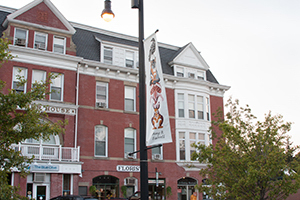 Amy R Farell totem style banner in front of Dutchess house