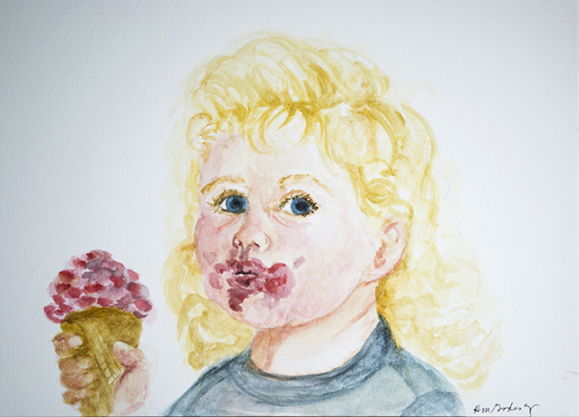 Little curly haired blonde child with ice cream cone