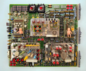 wall sculpture; Upcycled circuit boards, dolls, coins, and other COOL Stuff