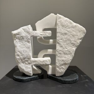A marble block carved into two pieces still locked together