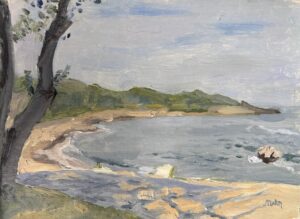 Curve of ocean shoreline, ocean on right, tree trunk on left.