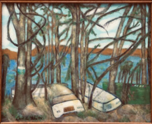 unturned boats, lakeside tucked into the trees, lake in background