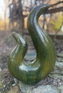 32 x 15-inch curly cement sculpture with green acid finish